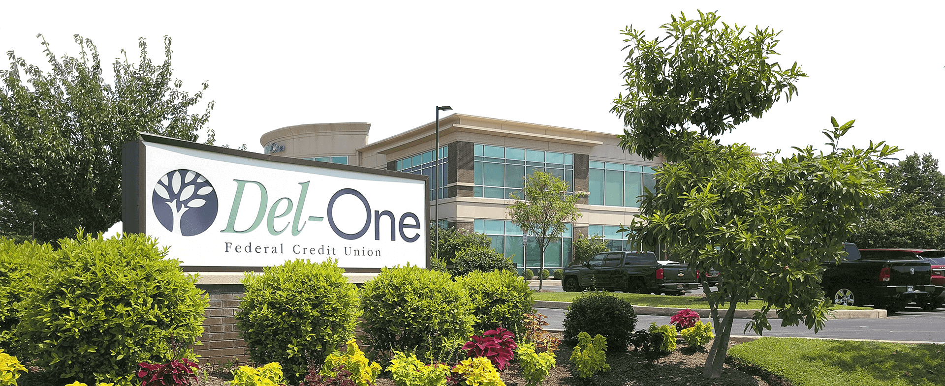 Image of an outdoor banner of Del-One FCU Image of an outdoor banner of Del-One FCU